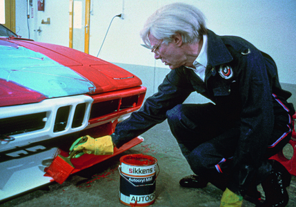Andy Warhol painting BMW M1, Hebertshausen, May 17, 1979. Colour photograph. Photo by Jean-Marie Bottequin, courtesy BMW Group Classic