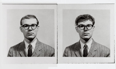 passport photo example showing front-facing headshot with neutral background and proper lighting