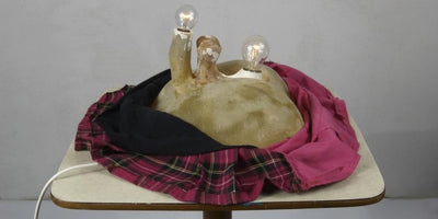 artworks that will make you laugh uncomfortably colorful abstract painting with exaggerated facial expressions and humorous elements