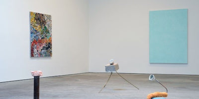 Guide to NYC summer shows 2014 promotional banner with city skyline background and event details