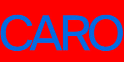 fall 2014 books preview stack of books on wooden table with blurred background