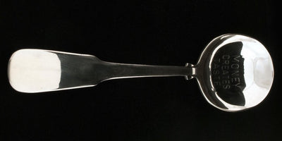 Conversation piece artwork by Jenny Holzer featuring a spoon on a 900x450 image