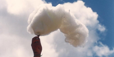 Artspace exhibition Clouds artwork displayed on wall with visitors viewing modern art pieces