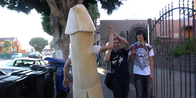 art and standup comedy performance on stage with microphone and audience laughing