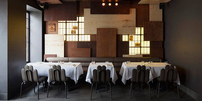 Istanbul Biennial guide promotional banner featuring artwork and event details in vibrant colors