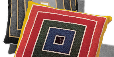 Frank Stella needlepoint pillows colorful geometric design close-up image