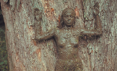 Ana Mendieta Stone Women artwork black and white photograph of female figure blending with natural stone background