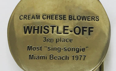 Cary Leibowitz colorful belt buckles art photograph 900x450