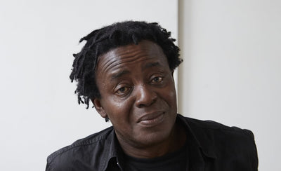 john akomfrah interview on brexit with a blurred background and 900x450 resolution