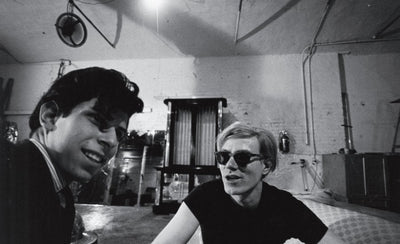 Stephen Shore photograph of Andy Warhol in a colorful urban setting