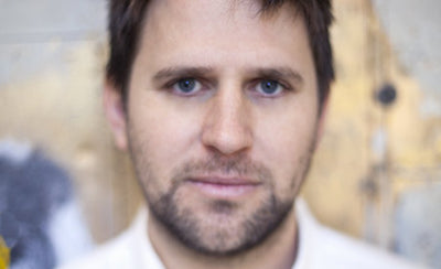 Anton Ginzburg interview portrait with blurred background