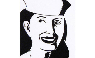 woodcuts art print with intricate designs in black and white on a wooden surface