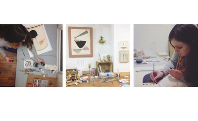 Athena artist direct story branding logo on wooden background with paintbrushes and art supplies