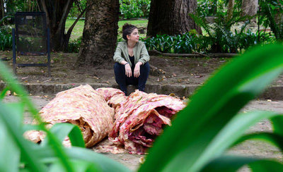 maria jimena artist directing video story on set with camera and crew in background