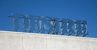 desire roof modern residential house with sloped roof and clear blue sky background