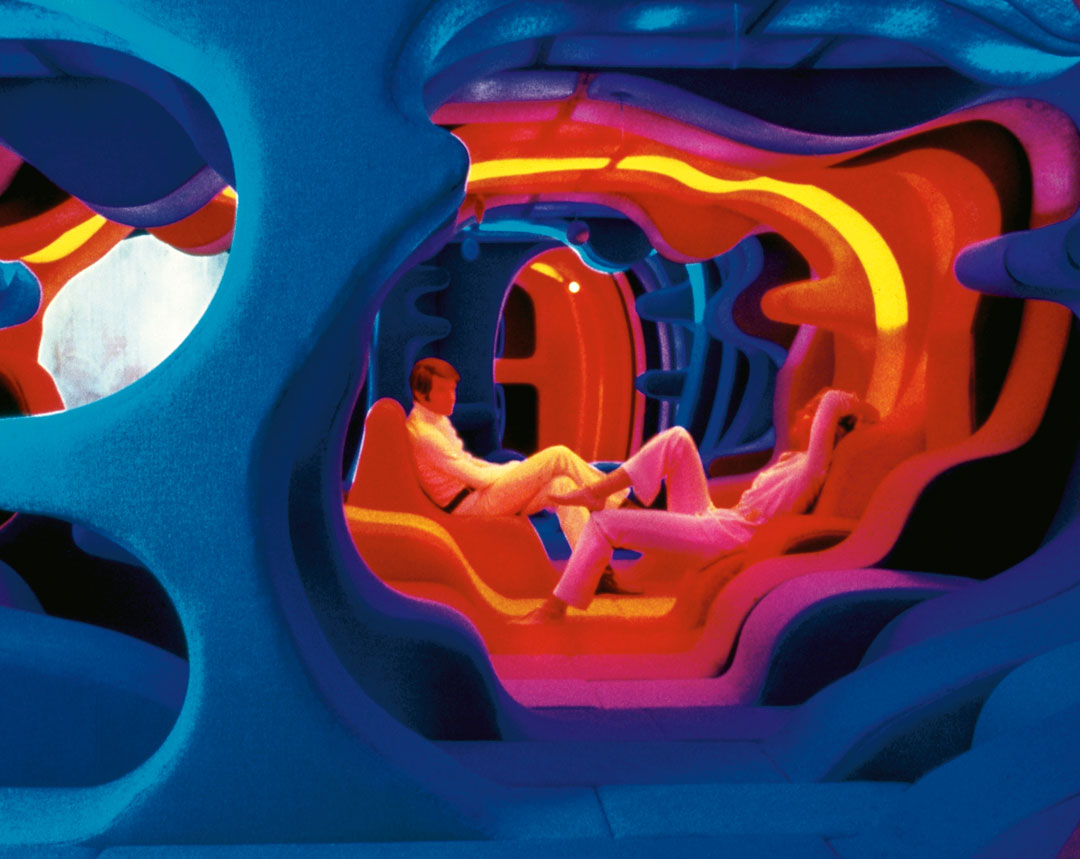 Visiona 2 (1970). A glimpse of Panton’s renowned exhibition for the Bayer textile firm, presented at the furniture fair in Cologne in 1970. The most spectacular exhibit was a 48 m2 (517 sq ft) landscape, where the visitor was literally immersed in a sea of colours and undulating forms