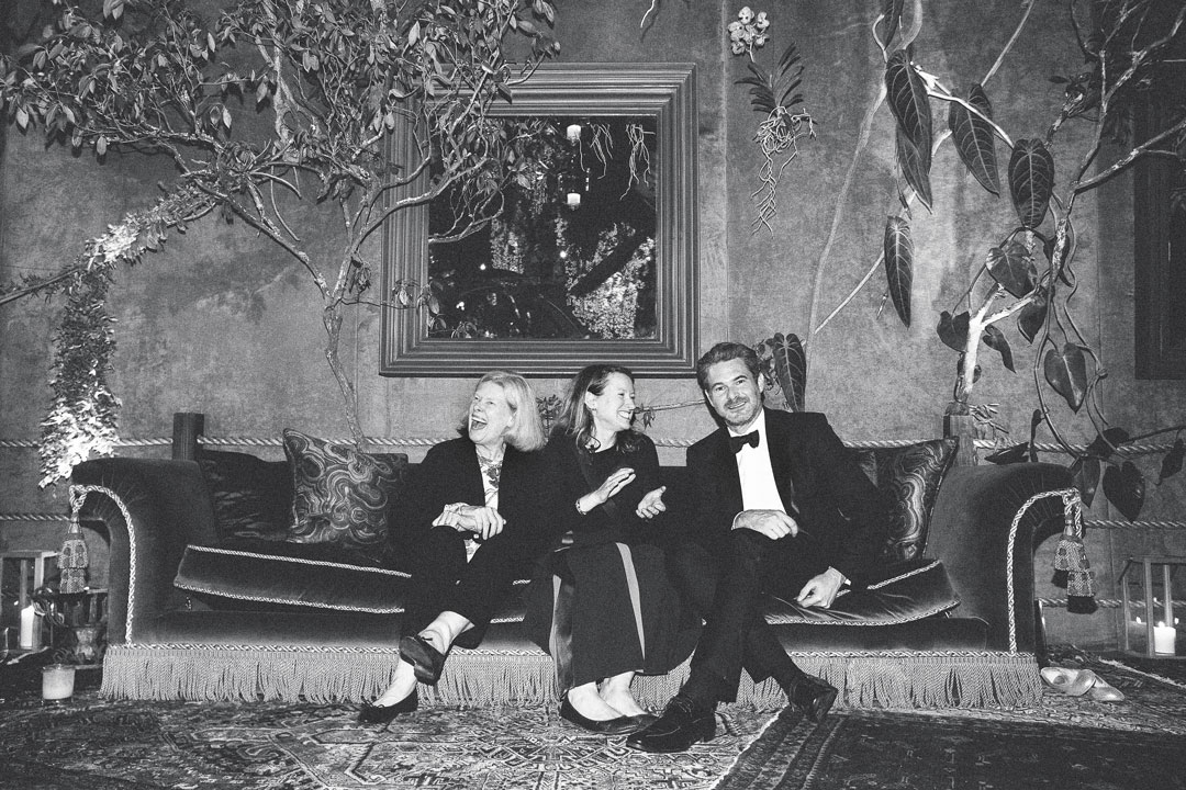 Bronson van Wyck in black tie (right) with his mother and sister