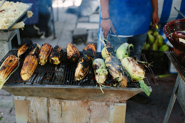 Barbecued corn stall, Mexico City. Photo by Araceli Paz. From Enrique Olvera’s Mexico From the Inside Out