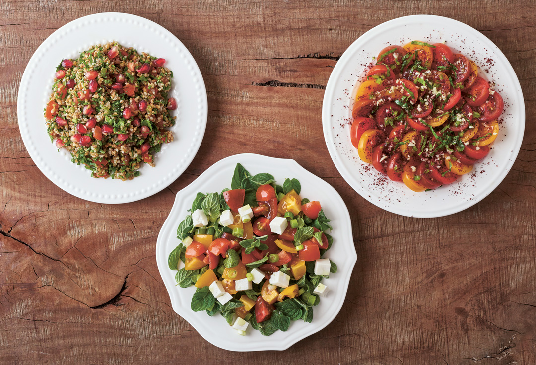 Salads, Sides, and Vegetables: from left: Teta Asma’s Tabuleh; Za’atar Salad; Tomato, Garlic and Sumac Salad