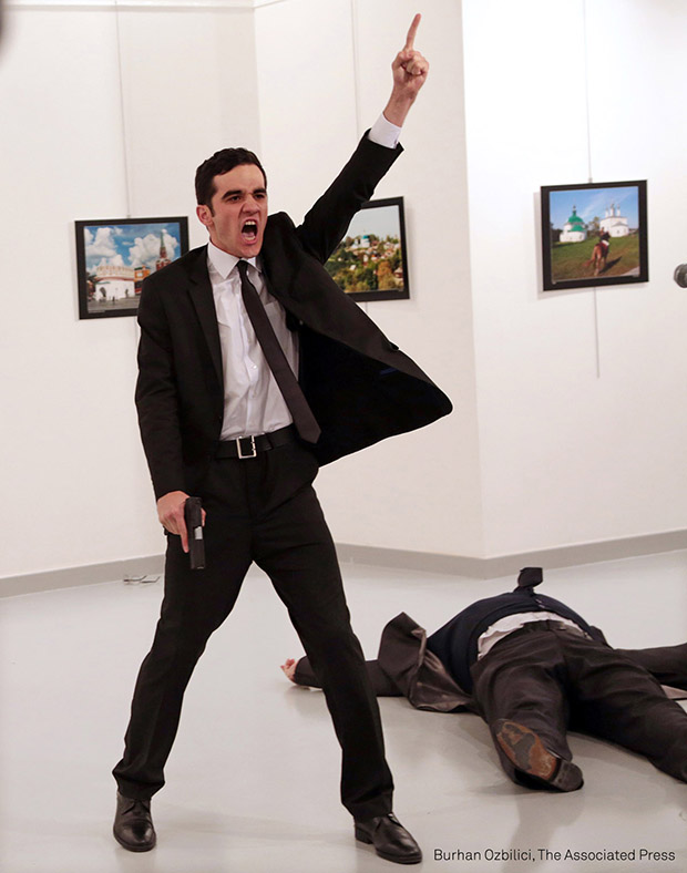 World Press Photo of the Year 2017. Mevlüt Mert Altıntaş shouts after shooting Andrey Karlov, the Russian ambassador to Turkey, at an art gallery in Ankara, Turkey. © Burhan Ozbilici, The Associated Press Title: An Assassination in Turkey