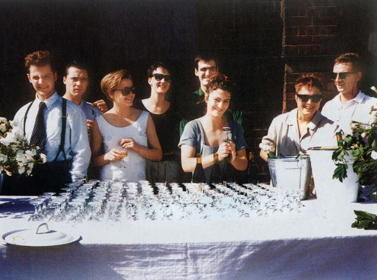 “Freeze” opening party, showing (left to right), Ian Davenport, Damien Hirst, Angela Bulloch, Fiona Rae, Stephen Park, Anya Gallaccio, Sarah Lucas and Gary Hume. As reproduced in Biennials and Beyond