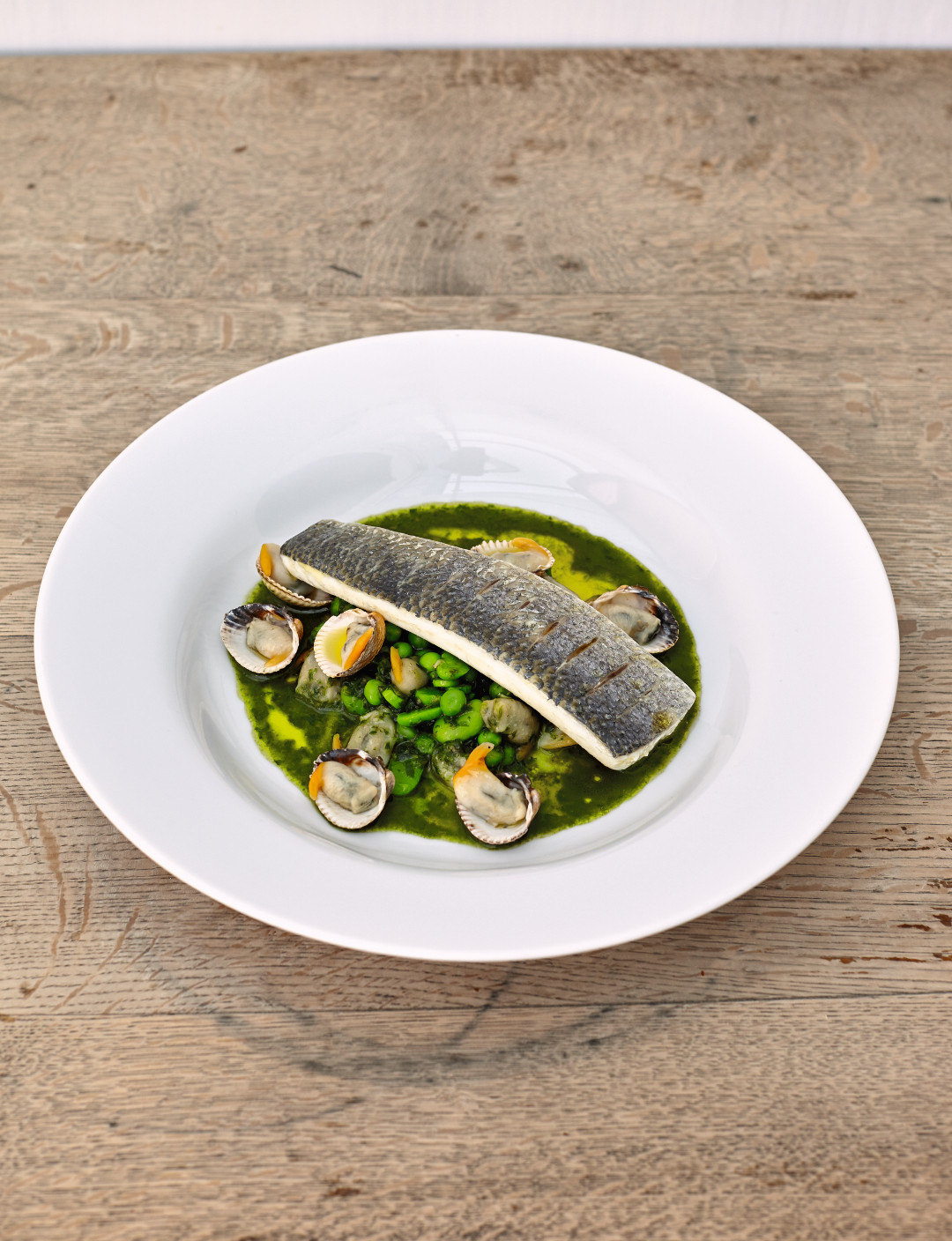 Steamed bass with cockles and summer pistou, from The Garden Chef