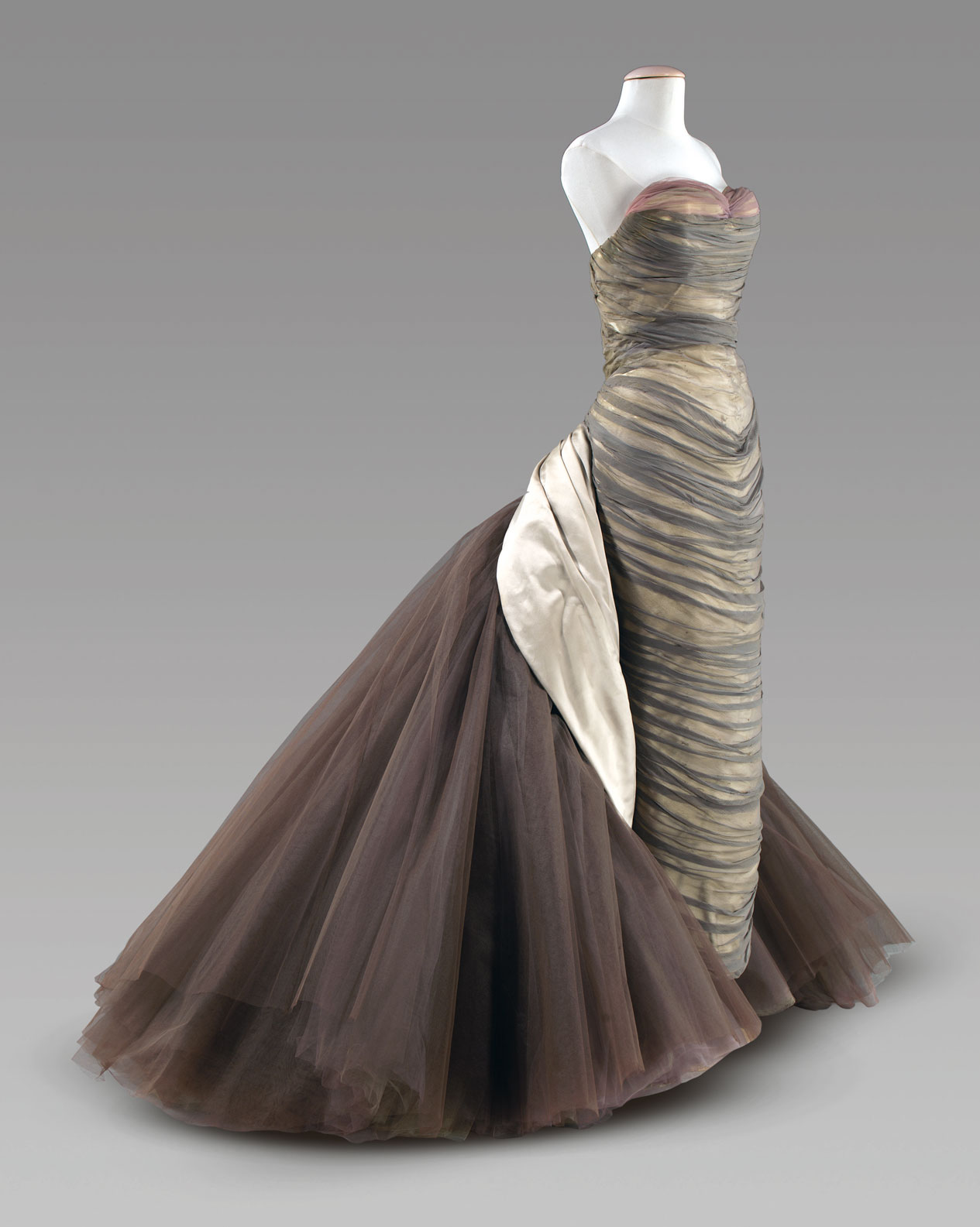 You love the ‘Butterfly’ (p.167, fig.7) by Charles James, a designer you’re less familiar with than Dior or Chanel, and you follow the essay cross-reference in the expectation of learning more about him. From Art =