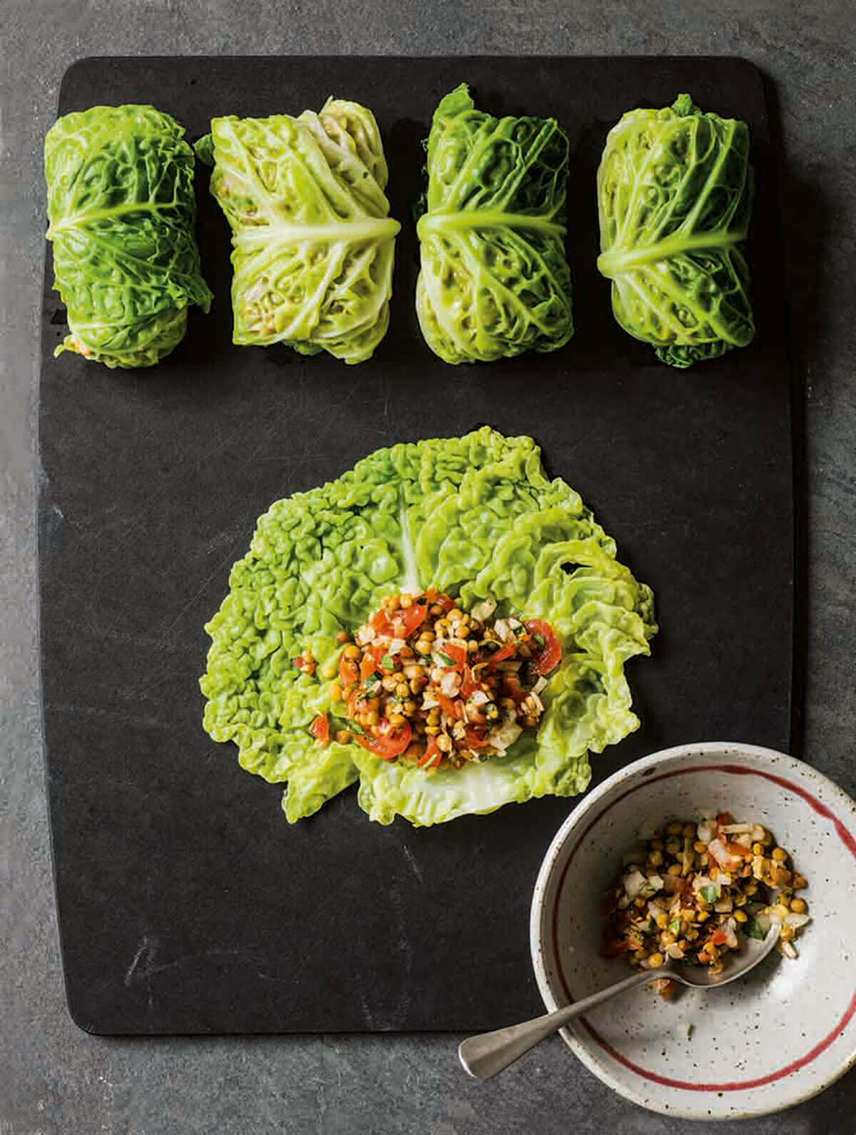 Stuffed cabbage leaves baked in tomato sauce, from The Middle Eastern Vegetarian Cookbook