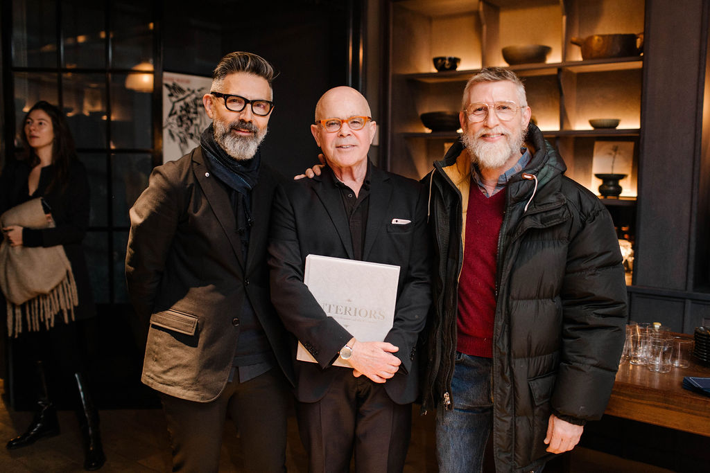 Phaidon's William Norwich (centre) with Todd Oldham (right) and a guest at the launch for Interiors: The Greatest Rooms of the Century at Roman and Williams Guild New York. All photographs by Jules Slütsky
