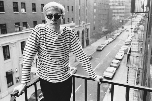 Andy Warhol on the fire escape of the Factory, 231 East 47th Street, 1965-7 by Stephen Shore, as reproduced in Factory: Andy Warhol