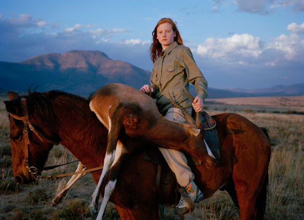 The 2010 winner of the Taylor Wessing Portrait Prize, David Chancellor's, Huntress with Buck, from the series, Hunters