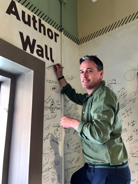 Aaron signs the author wall at Hub City Bookshop & Press, Spartanburg, South Carolina