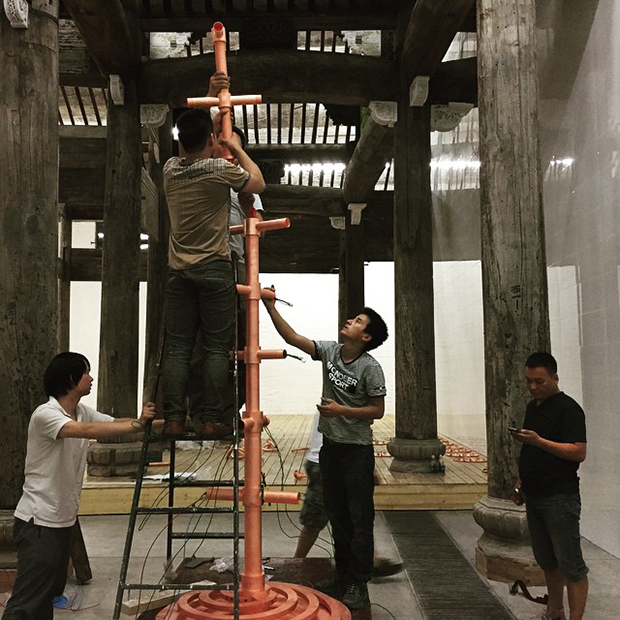 Workers installing Ai Weiwei's new show. Image courtesy of Ai Weiwei's Instagram