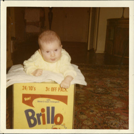 Lisanne on the Brillo box in a still from her new film Brillo Box (3¢ Off)