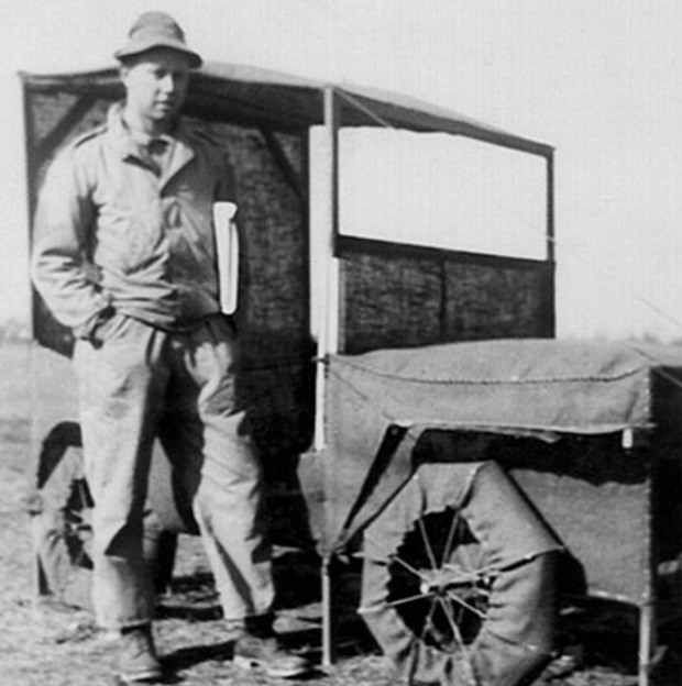 Ellsworth Kelly next to a Jeep during his days in a camouflage battalion