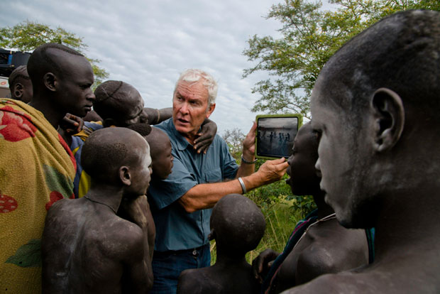 John Rowe with tribe members Copyright:  Steve McCurry