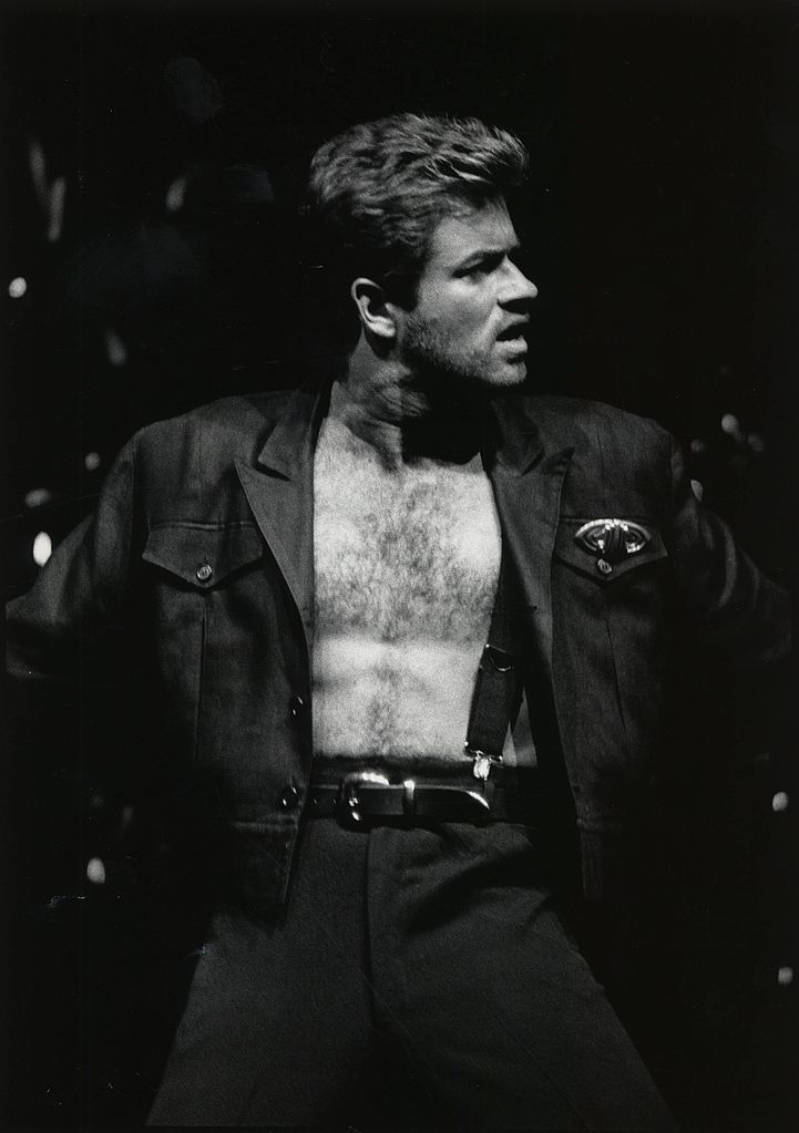 George Michael performing on stage during the Faith World Tour in 1988. Courtesy of the University of Houston Digital Library, public domain