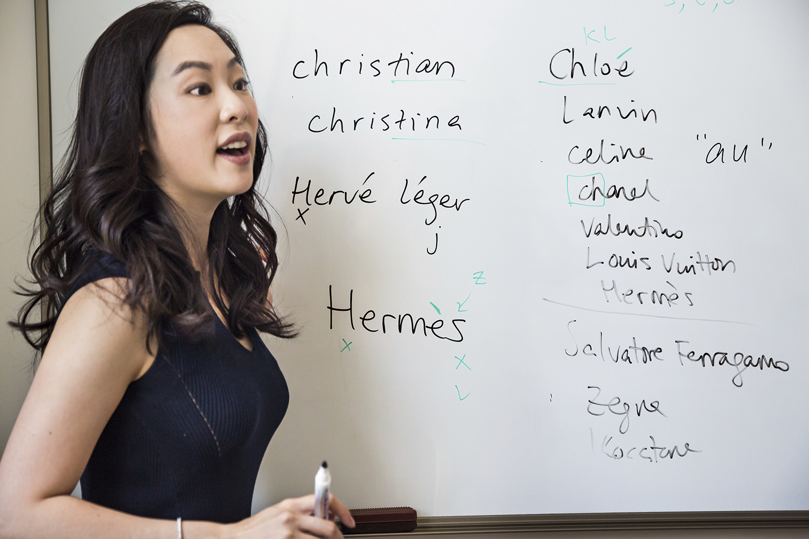 Sara Jane Ho, 28, teaches etiquette skills for the wealthy, such as the proper pronunciation of foreign luxury brand names, Beijing, 2014; a still from Generation Wealth