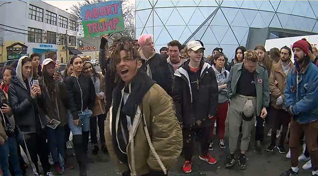 Jaden Smith (centre) and Shia LaBeouf (right) at He Will Not Divide Us, 2016 by LaBeouf, Rönkkö & Turner