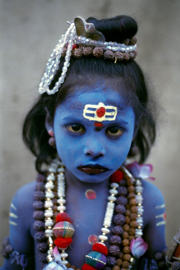 Young Child dressed as Shiva, seeks alms, Uttarakhand, India (1998) by Steve McCurry. From Steve McCurry: India