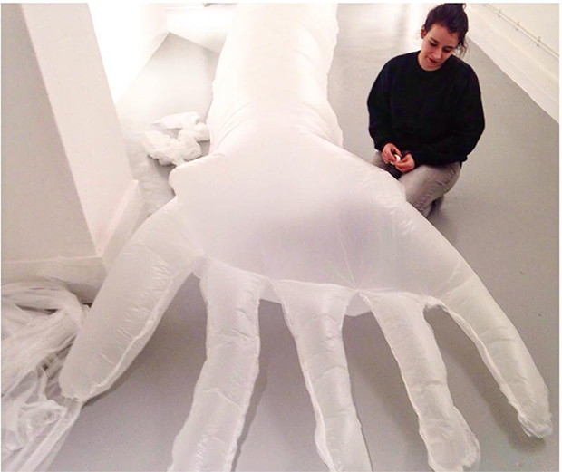 Artist Katie Hayward works on her inflatable limb pieces, to be shown at the Koppel Project
