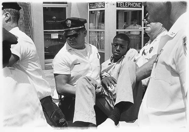 The arrest of Eddie Brown, a former gang leader, in Albany, Georgia 1962. The first arrest Lyon witnessed in the south - Danny Lyon from The Seventh Dog