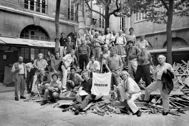 The photographers of the Magnum Photo Agency with René Burri to the right holding the teeshirt

