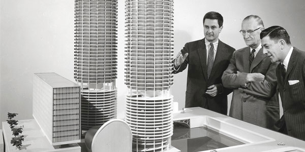 Goldberg showing the maquette for Marina City, Chicago