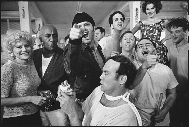 The cast of One FlewOver the Cuckoo’s Nest posing for their picture on location at Oregon State Hospital, 1975, by Mary Ellen Mark