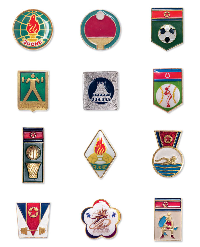 A selection of sporting badges from North Korea. The 'Juche' badges are in the middle column third row down from the top, and in the top row, far left