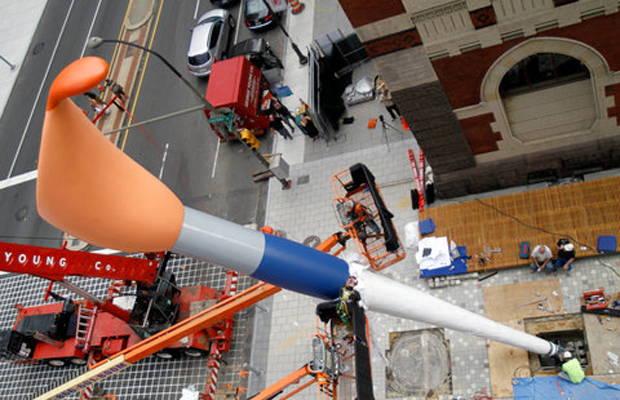 The installation of Claes Oldenburg’s ‘Paint Torch’ outside the Pennsylvania Academy of the Arts in Philadelphia 