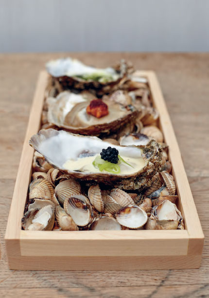 Poached rock oysters with pickled cucumber, beurre blanc and avruga caviar, as featured in The Sportsman