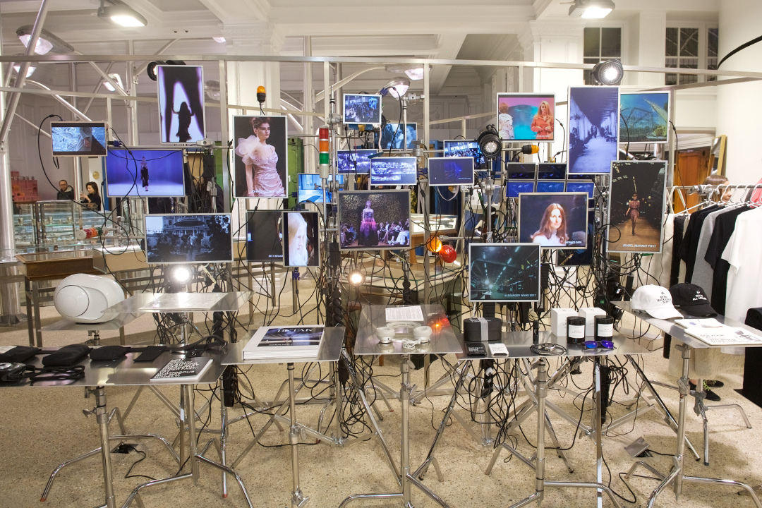 Dover Street Market's screen heavy display for Betak: Fashion Show Revolution