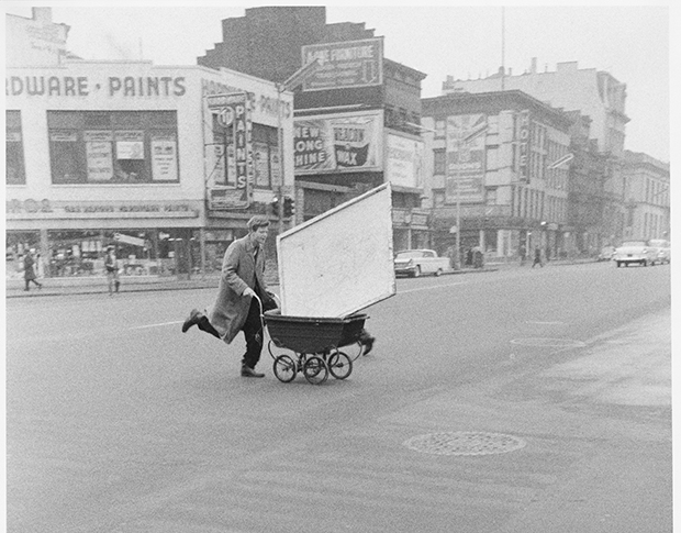 Red Grooms transporting an artwork to Reuben Gallery, New York, 1960 (detail) photo by John Cohen, . Gelatin silver print, 10 x 6 3/4 in. © John Cohen. Image courtesy of the Grey Art Gallery